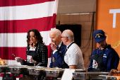 U.S. President Biden attends a dinner with U.S. service members and their families ahead of Thanksgiving at U.S. Coast Guard Sector New York on Staten Island