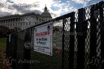 Security fencing encircles the US Capitol building in Washington