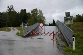 A view shows a blocked passage to a flooded area of the river Naarn, near Perg