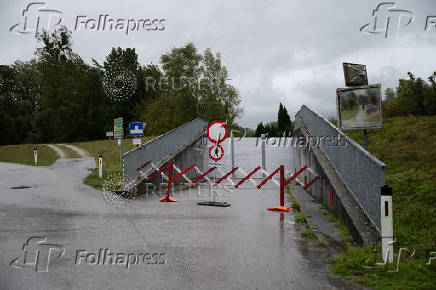 A view shows a blocked passage to a flooded area of the river Naarn, near Perg