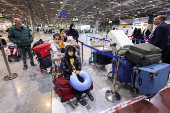 Displaced Lebanese, who had fled to Iraq, prepare to head back home after a ceasefire between Israel and Hezbollah took effect, in Najaf