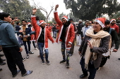 Pakistan's Christian minority dressed up as Santa hold rally in Peshawar