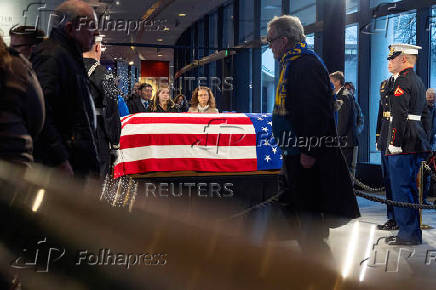 Mourners view the casket of former President Jimmy Carter as he lies in repose at the Jimmy Carter Presidential Library and Museum in Atlanta