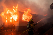 Palisades Fire burns during a windstorm on the west side of Los Angeles