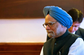 FILE PHOTO: India's PM Singh talks to Lesotho's PM Thabane during a meeting in New Delhi