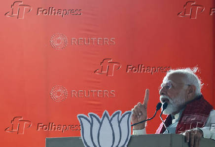 India's Prime Minister Narendra Modi attends an election campaign in Bengaluru