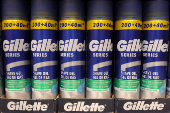 Gillete products are displayed on a shelf in a supermarket