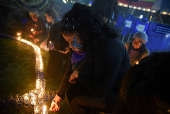 Demonstrators hold a vigil ahead of International Day for the Elimination of Violence Against Women, in Guatemala City