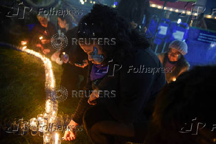 Demonstrators hold a vigil ahead of International Day for the Elimination of Violence Against Women, in Guatemala City