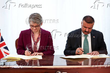 Britain's Home Secretary Yvette Cooper meets Iraq's Minister of Interior Abdul Amir Al-Shammari, in Baghdad