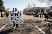 People protest against Tesla and Elon Musk during rallies across the country