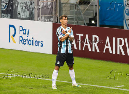 Ferreirinha, jogador do Grmio, comemora seu gol