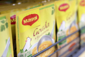 Packets of Maggi soup are displayed on a shelf in a supermarket