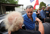 Uruguay's President-elect Yamandu Orsi meets with former President Jose 