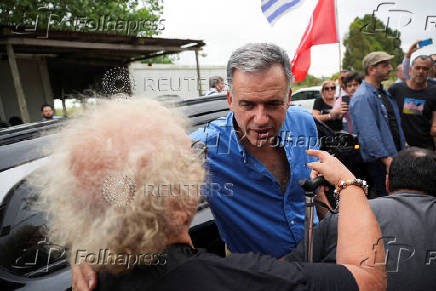 Uruguay's President-elect Yamandu Orsi meets with former President Jose 