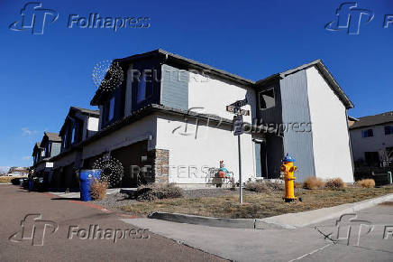 Investigators search a townhouse, in relation to the explosion in Las Vegas of a Tesla Cybertruck