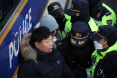 South Korean court issues arrest warrant for impeached President Yoon