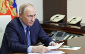 Russian President Vladimir Putin chairs a meeting on economic issues via a video link