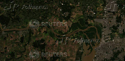 A satellite image shows a view of an area before flooding in Porto Alegre
