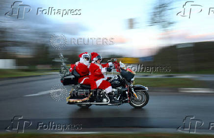 Riding Santas take part in their 10th Harley Davidson motorcycle ride near Neustadt an der Weinstrasse