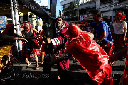 Filipino Catholics re-enact the Passion of Jesus Christ on Maundy Thursday in Mandaluyong City