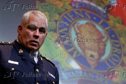 RCMP Commissioner Duheme takes part in a press conference in Ottawa