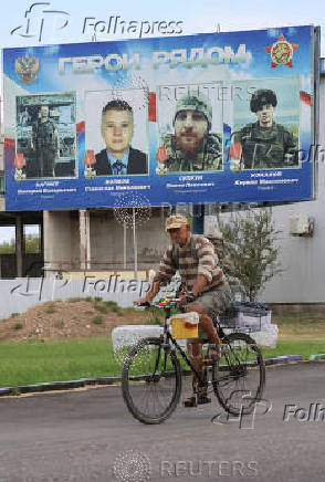 A man rides a bicycle in Saki, Crimea