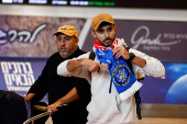 Israeli Maccabi Tel Aviv soccer fans arrive at the Ben Gurion International Airport