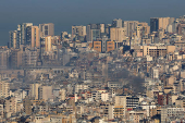 Smoke billows over Beirut's southern suburbs, after an Israeli strike