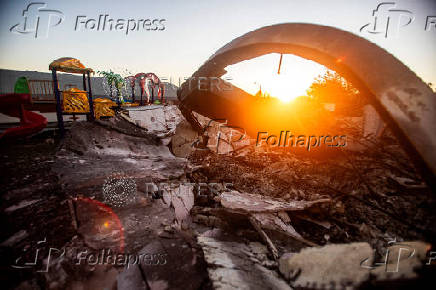 Firefighters hold the line against two massive wildfires in Los Angeles County