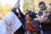 People bring their pets to be blessed on Saint Anthony's day, on the outskirts of Mexico City