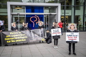 Animal rights activists protest against scientific experiences on animals in Paris