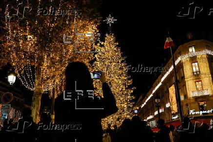 Paris Olympics chief Estanguet turns on Christmas lights on the Champs Elysees