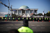 Protesters take part in a rally calling for the impeachment of South Korean President Yeol, in Seoul