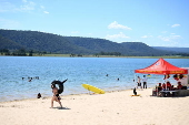 People find relief from the summer heat at Penrith Beach in Australia