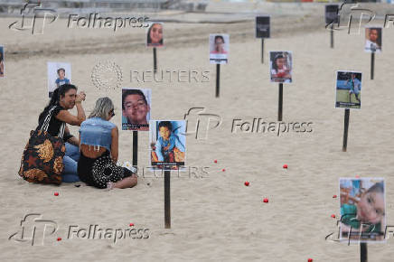 NGO Rio de Paz protests against children shot dead during police operations, at Copacabana beach in Rio de Janeiro