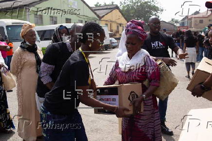 Boxes of supplies are distributed to the poor in Lagos