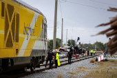 Brightline passenger train collides with fire truck on railtracks in Delray Beach