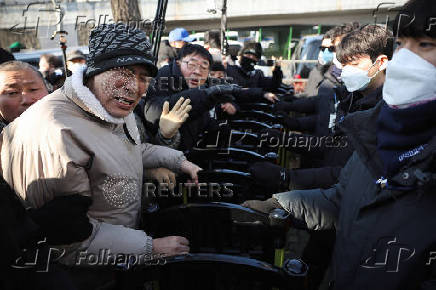 South Korean court issues arrest warrant for impeached President Yoon