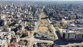 A drone view shows damaged and destroyed buildings, following a ceasefire between Israel and Hamas, in Gaza City