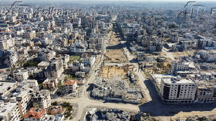 A drone view shows damaged and destroyed buildings, following a ceasefire between Israel and Hamas, in Gaza City