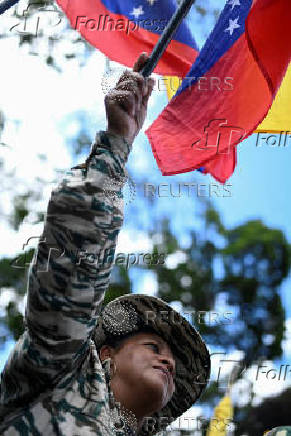 Members of Venezuela's Bolivarian militia participate in a march following a nationwide military exercise, in Caracas