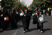 Demonstrators rally against Israel's strikes on Gaza and Lebanon in Tehran