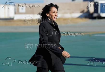 Democratic presidential nominee and U.S. Vice President Harris boards Air Force Two upon her departure from San Francisco, California