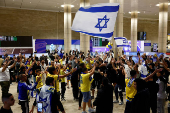 Maccabi Tel Aviv soccer fans arrive at the Ben Gurion International Airport