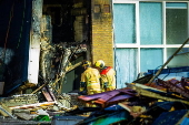 At least five dead after explosions hit apartment block in The Hague