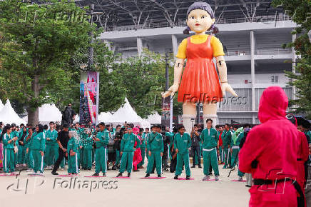 Players take part in the Red Light, Green Light game at Gelora Bung Karno Stadium ahead of the release of the Netflix series Squid Game: Season 2 in Jakarta