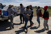 Aid worker provides food to migrants in Jacumba Hot Springs, California