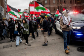 Protest in front of the residence of the University of Michigan's president, in Ann Arbor