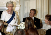 FILE PHOTO: Queen Elizabeth II makes a toast alongside U.S. President Bush at the White House in Washington